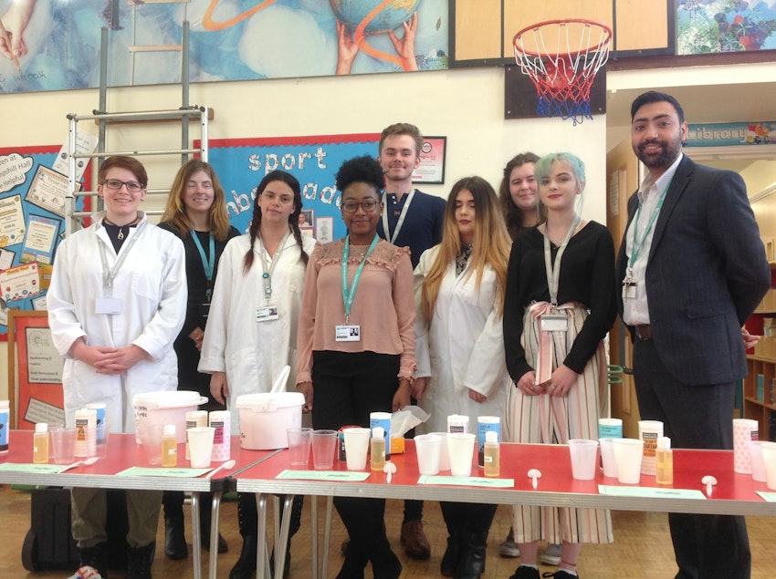 Science Lecturer Jet Tengatenga (front centre, green lanyard), and Work Experience Co-ordinator Dal Singh (far right) with Science students and a representative from Hempshill Hall Primary School (second from left) at the event.
