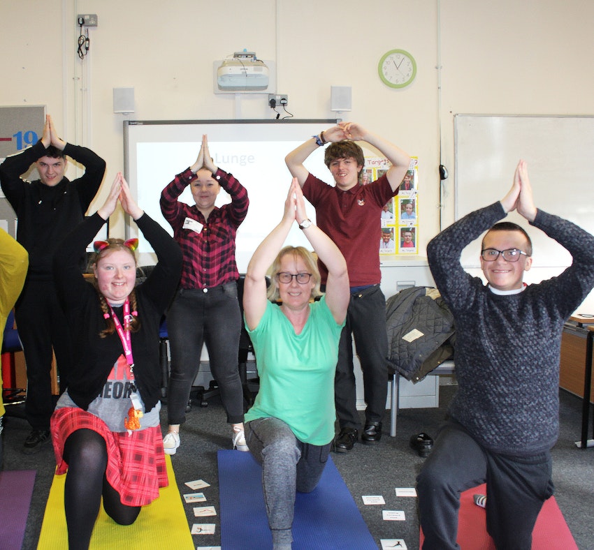 Pupils from Foxwood Academy try their hand at yoga