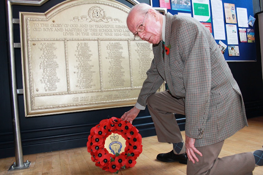 Person laying a wreath for remembrance day