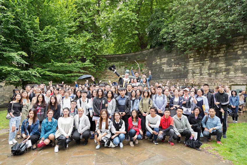 A large group of students gathered near Nottingham Castle for a picture